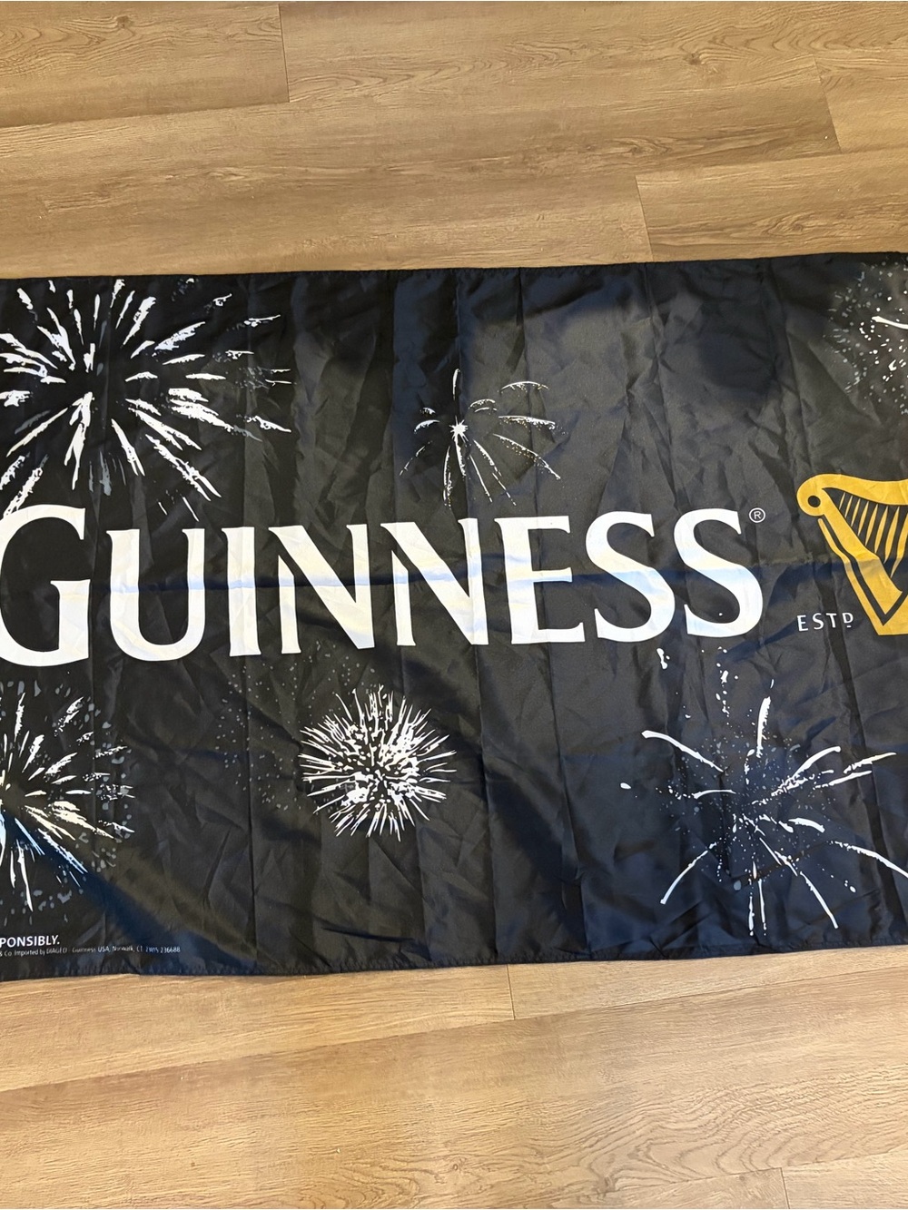 Guinness Black Banner with White Logo and Gold Harp
